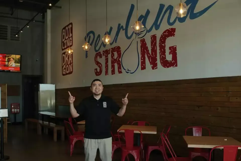 Harold Wong at the Pearland Strong wall inside Boiling Dragon